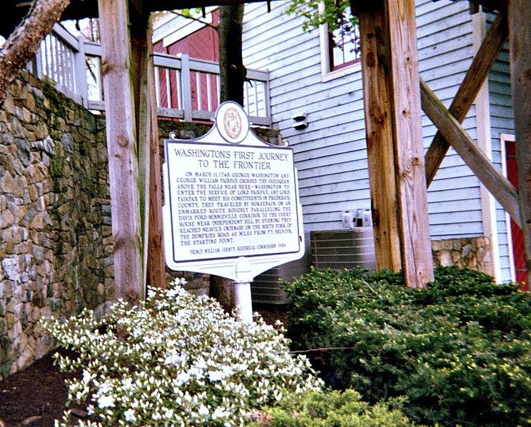 Historical marker in front of historic site.