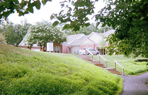 Active adult living communities resident washing his car.