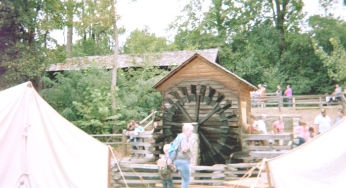 Picture of people at a colonial mill.