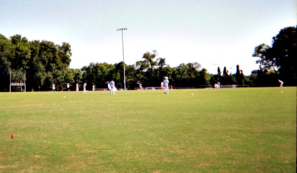 Playing a sports game in the park.